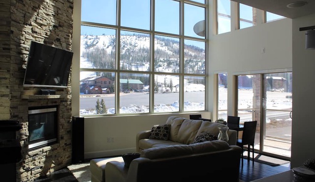 FRONT AND CENTER for 8! PANORAMIC VIEWS! Wall of windows facing slopes! GARAGE!