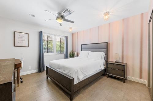 Luxury Villa, with bonus pool house, Private Pool, Hot tub, rock water fall and slide, putting green, basketball, shuffle board, play gym, privately gated on circular driveway.